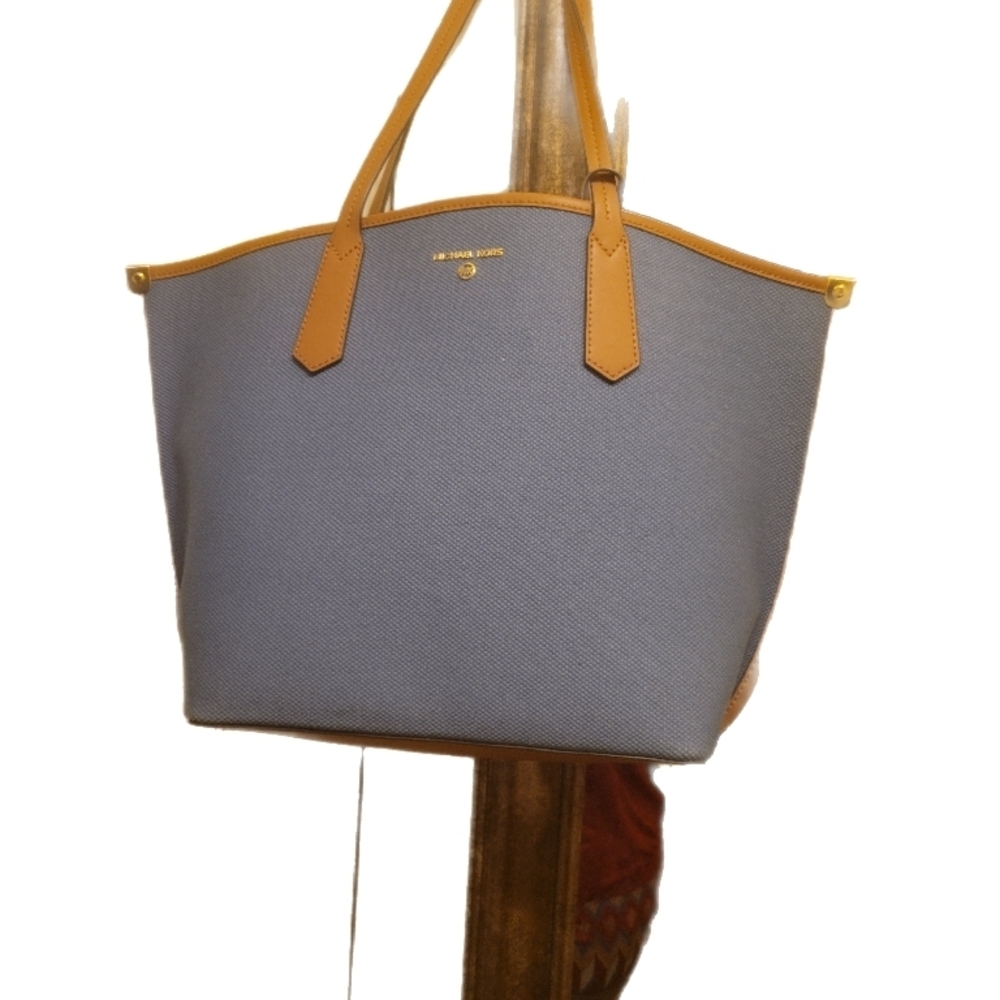 Authentic Michael Kors large tote bag in a beautiful blue canvas with tan leathe